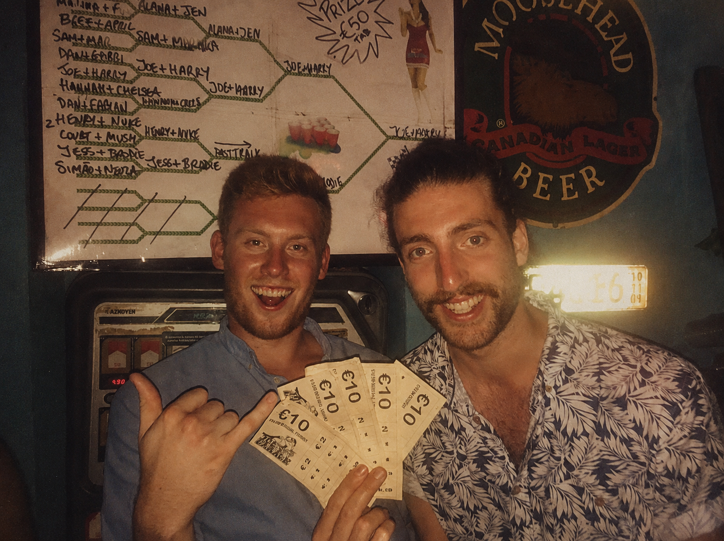 Host Prince Harry with a beer pong winner